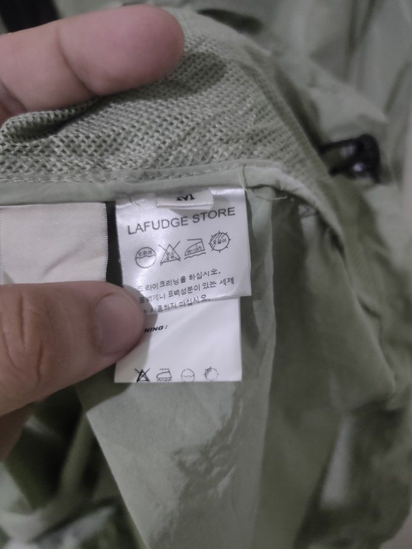 LAFUDGE STORE Windbreaker (Category: Coats, Jackets and Outerwear) located in Ozamiz City. Submitted by ukaygrails (Listing ID 1462668242, Image 3). Description: Like New condition No issue YKK Vislon zipper 3 pockets(1 pocket on left sleeve) Packable hoodie Dimes 23.5/26.