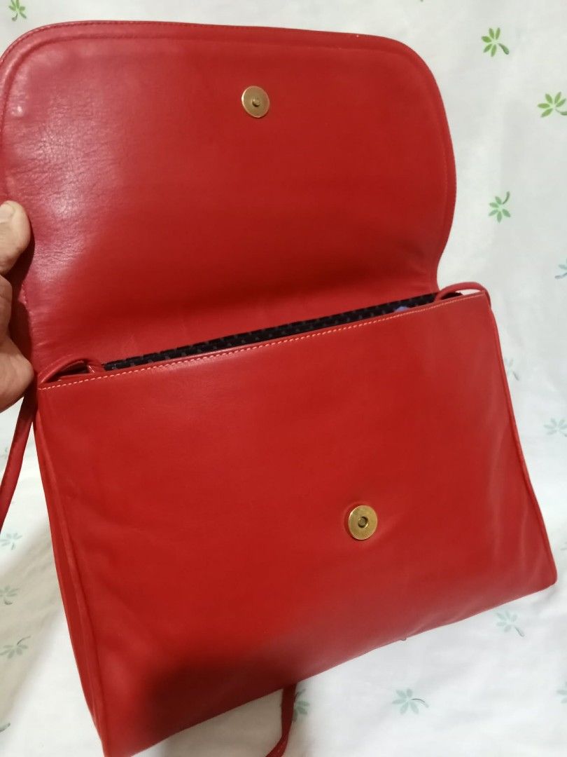 Lanvin Red Leather Shoulder Bag (Category: Shoulder Bags) located in Baguio. Submitted by sheren_signatures (Listing ID 1462620483, Image 3). Description: - Genuine red leather shoulder bag by Lanvin - Textured flap with secure magnetic snap closure - Interior zippered pocket for essentials - Adjustable strap for comfortable wear - Classic and versatile design, suitable for everyday or evening use.