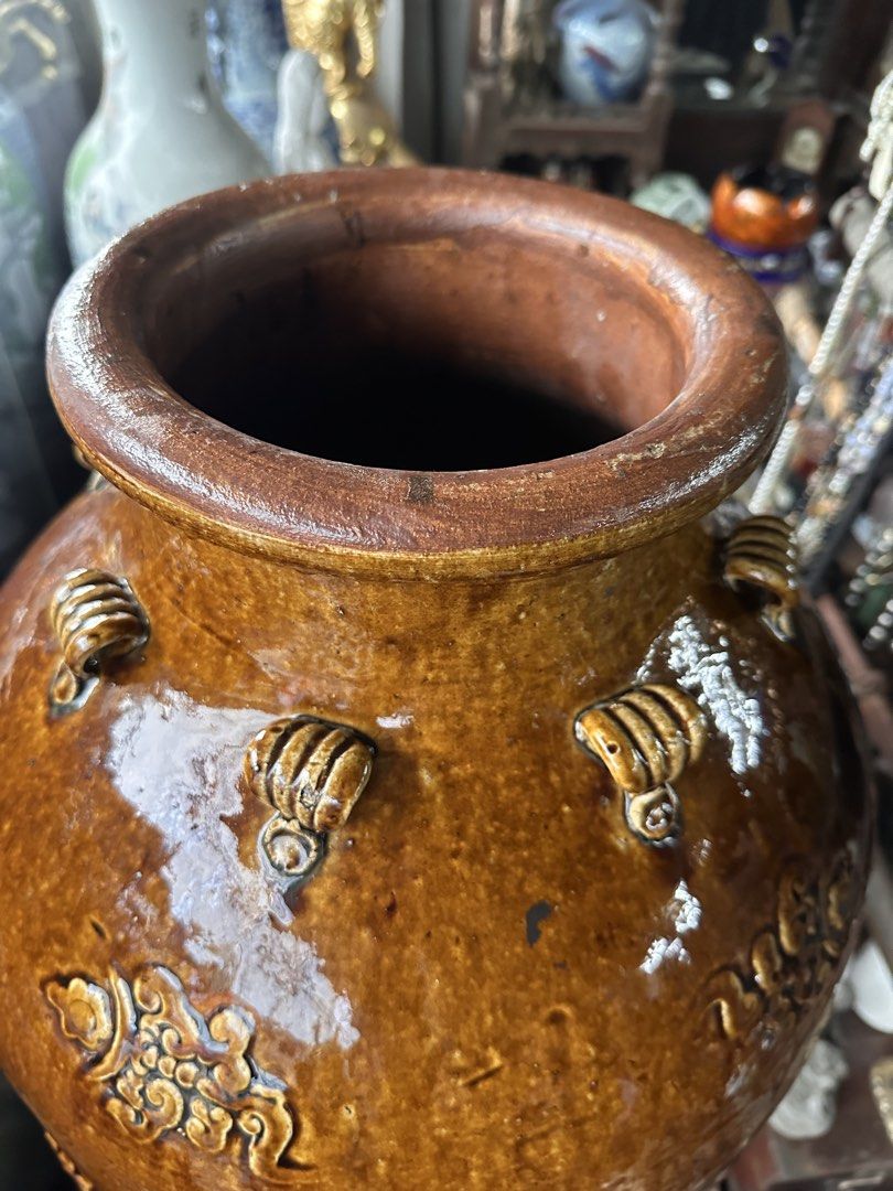 Large Vintage Brown Ceramic Dragon Vase (Category: Vases & Decorative Bowls) located in Quezon City. Submitted by anjherga27 (Listing ID 1462561278, Image 3). Description: - Big brown ceramic vase - Dragon and cloud motifs - Rustic, glazed finish - Approx. 32 inches tall - Opening is about 6 inches wide - Ideal for large floral arrangements or as a statement piece.