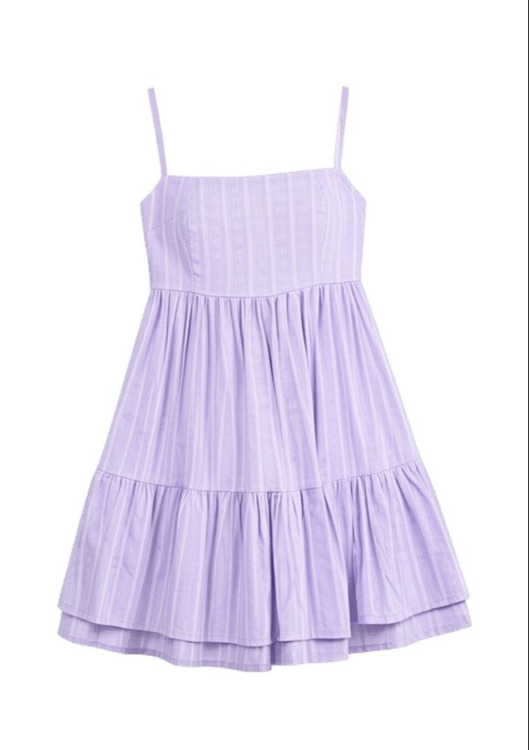 Lavender Tiered Mini Dress with Tie Back (Category: Dresses) located in Muntinlupa City. Submitted by sheisthestars (Listing ID 1462597994, Image 1). Description: Lavender Tiered Mini Dress with Tie Back- Adorable lavender mini dress - Features a tiered skirt for a playful look - Chic tie-back detail for adjustable fit - Subtle textured fabric adds a unique touch - Adjustable spaghetti straps for comfort - Versatile for casual days or summer even