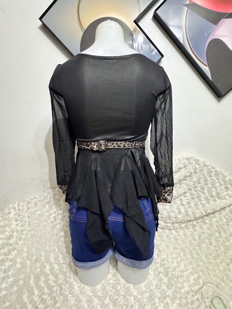 Leopard Print Sheer Sleeve Peplum Top (Category: Others Tops) located in Marikina City. Submitted by lorradel (Listing ID 1462460684, Image 3). Description: - Eye-catching leopard print - Sheer black sleeves for a stylish contrast - Flattering peplum hem with ruffled chiffon detail - Versatile: pairs well with jeans or shorts - Unique design for a bold, statement look - Ideal for evening wear or making a fashion statement - MAY HAVE some washable