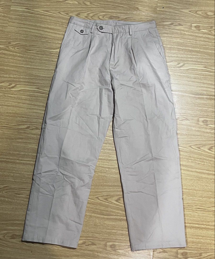Zara Light Beige Pleated Trousers (Category: Trousers) located in Quezon City. Submitted by reecepalafox (Listing ID 1462524019, Image 1). Description: - Light beige trousers - Pleated front design - Two button closure at the waist - Two back pockets with button closure - Note: Button on the left front is slightly loose - Perfect for casual or smart casual occasions.