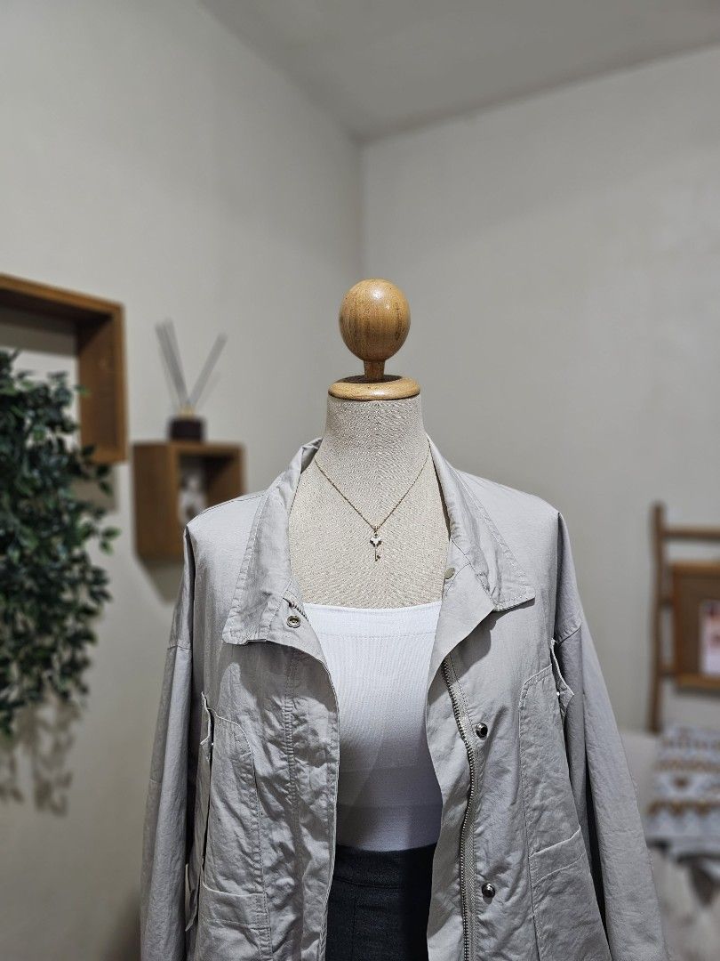 Light grey jacket (Category: Coats, Jackets and Outerwear) located in Pasig City. Submitted by geesbox (Listing ID 1462461498, Image 2). Description: .