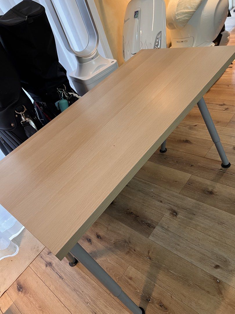 Light Wood Desk with Adjustable Legs (Category: Tables & Sets) located in Manila. Submitted by adi.f27 (Listing ID 1462448834, Image 3). Description: - Simple and functional desk with a light wood finish. - Adjustable height legs for versatile use. - Ideal for home office, study area, or crafting space. - Easy to assemble and move. - Selling as part of a decluttering effort..