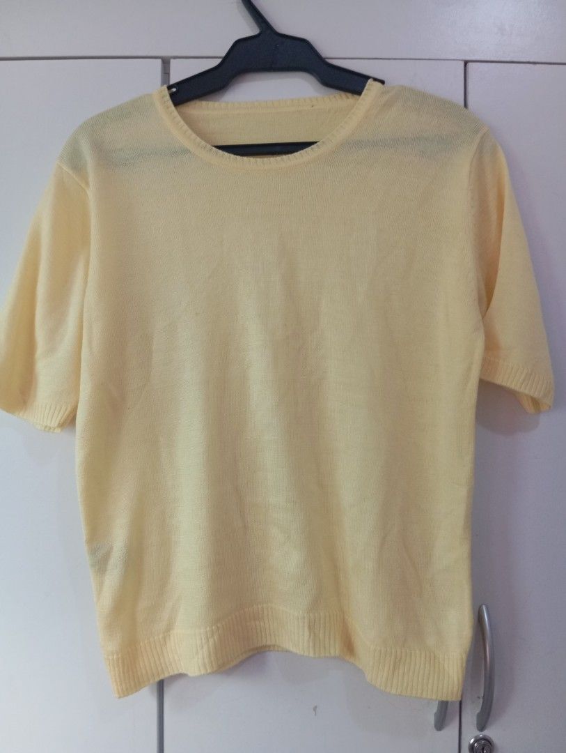 Light Yellow Short Sleeve Knit Top (Category: Blouses) located in Manila. Submitted by brion123 (Listing ID 1462440902, Image 1). Description: - Simple light yellow knit top - Short sleeves with ribbed cuffs - Ribbed hemline - Please note: small marks on fabric (refer to close-up photo for details).