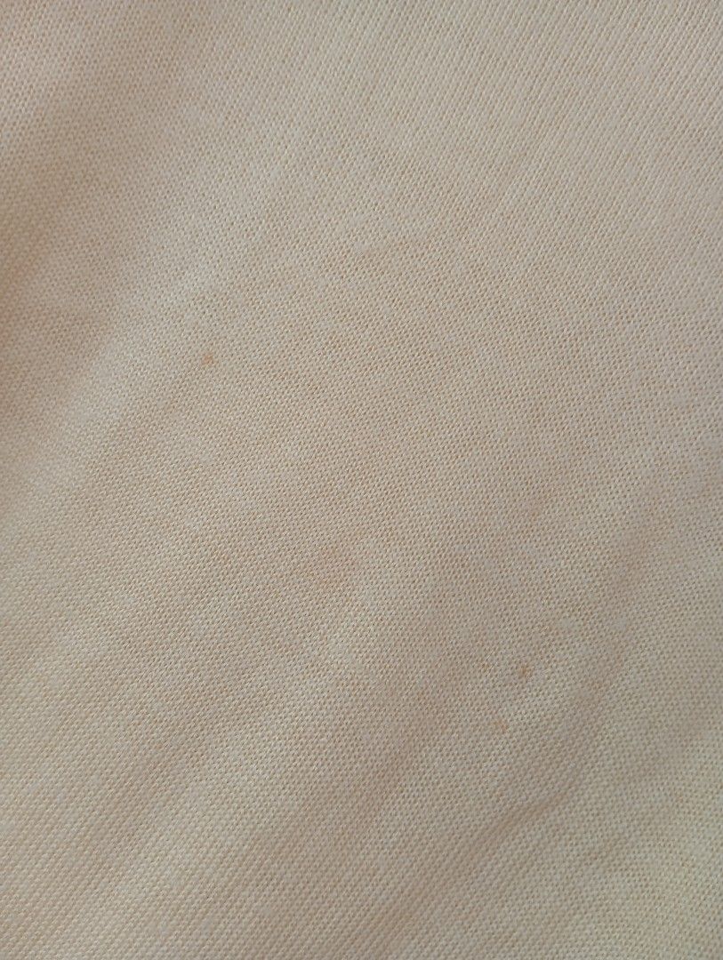 Light Yellow Short Sleeve Knit Top (Category: Blouses) located in Manila. Submitted by brion123 (Listing ID 1462440902, Image 2). Description: - Simple light yellow knit top - Short sleeves with ribbed cuffs - Ribbed hemline - Please note: small marks on fabric (refer to close-up photo for details).