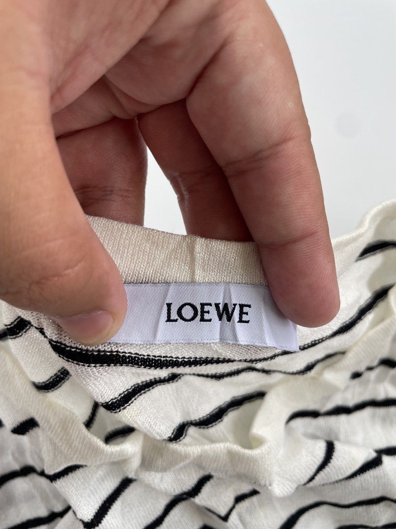 loewe (Category: Shirts) located in General Mariano Alvarez. Submitted by savenlester (Listing ID 1462628947, Image 3). Description: Loewe ◾W - 17 ◾L - 25 ◾Good condition ◾Color rate 9/10 ◾No issue .