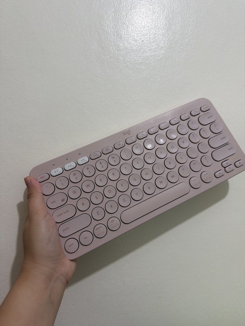 Logitech K380 Multi-Device Bluetooth Keyboard (Category: Computer Keyboard) located in Dasmarinas. Submitted by findfindspreloved_14 (Listing ID 1462468254, Image 1). Description: - Logitech K380 Bluetooth Keyboard - Lovely Dusty Rose color - Compact and portable design - Connects to multiple devices (computers, tablets, phones) - Easy device switching - Shows light scuffs from normal use.