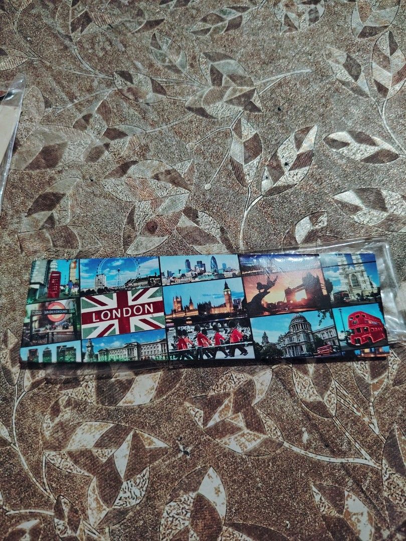 London Souvenir Fridge Magnet with Multiple Landmarks (Category: Vintage Collectibles) located in Bulacan. Submitted by mixtoys.ph (Listing ID 1462516724, Image 1). Description: - Features iconic London landmarks: Big Ben, London Eye, and a red double-decker bus. - Ideal as a travel souvenir or gift for London enthusiasts. - Adds a touch of London charm to your kitchen or any magnetic surface..