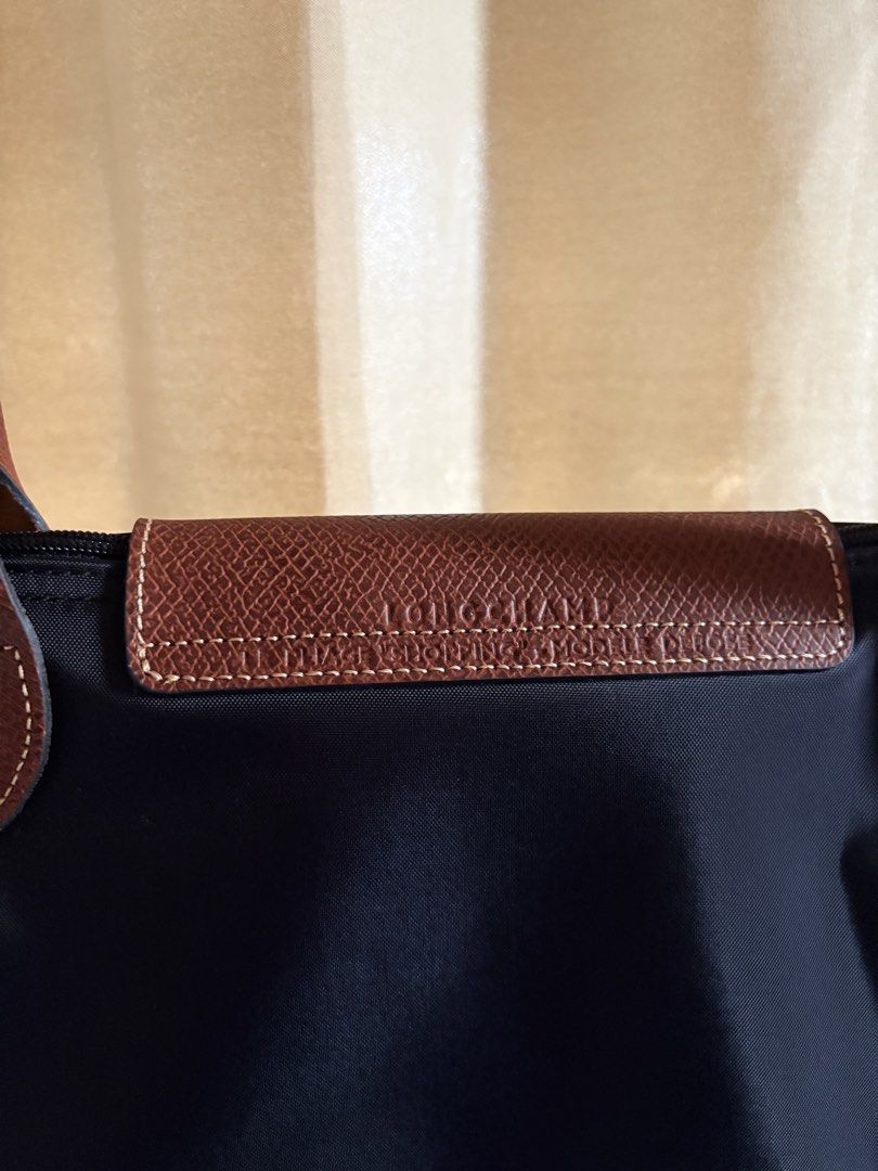 Longchamp preloved large long handle black (Category: Tote Bags) located in Bacolod City. Submitted by poppylouri.ph (Listing ID 1462510452, Image 3). Description: Authentic. Like new. Longchamp large long handle le pliage black. No flaws. MOP: Gcash, gotyme bank or BPI only! NO COD. SF c/o buyer. .