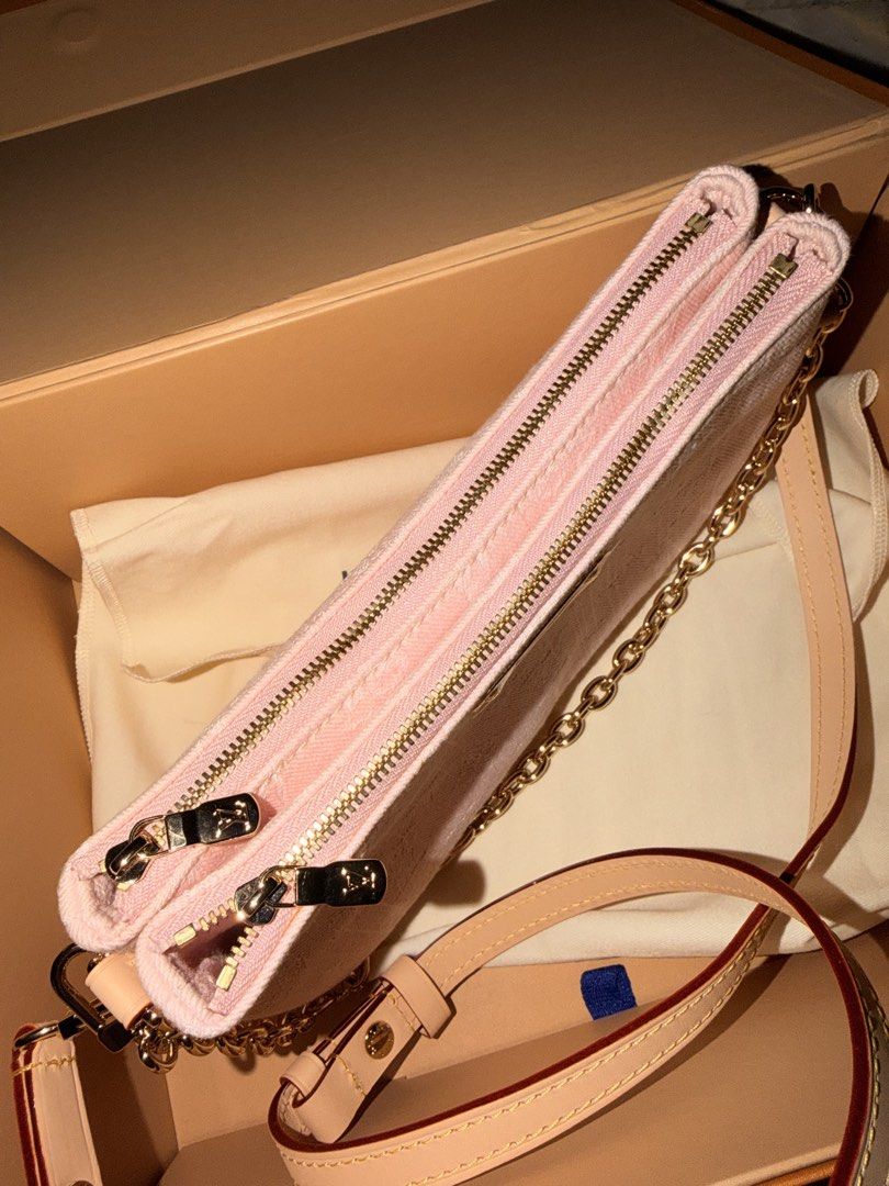 Louis Vuitton Pink Monogram Pochette with Gold Chain (Category: Luxury Bags & Wallets) located in Las Pinas. Submitted by twiceloved24 (Listing ID 1462483273, Image 2). Description: - Lovely pink monogram canvas - Chic gold chain strap - Detachable leather strap - Double zip closure for easy access - Interior leather tag: 'LOUIS VUITTON PARIS made in Spain' - Comes with dust bag and box.