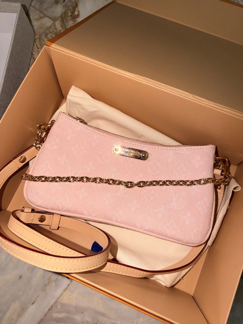 Louis Vuitton Pink Monogram Pochette with Gold Chain (Category: Luxury Bags & Wallets) located in Las Pinas. Submitted by twiceloved24 (Listing ID 1462483273, Image 1). Description: - Lovely pink monogram canvas - Chic gold chain strap - Detachable leather strap - Double zip closure for easy access - Interior leather tag: 'LOUIS VUITTON PARIS made in Spain' - Comes with dust bag and box.