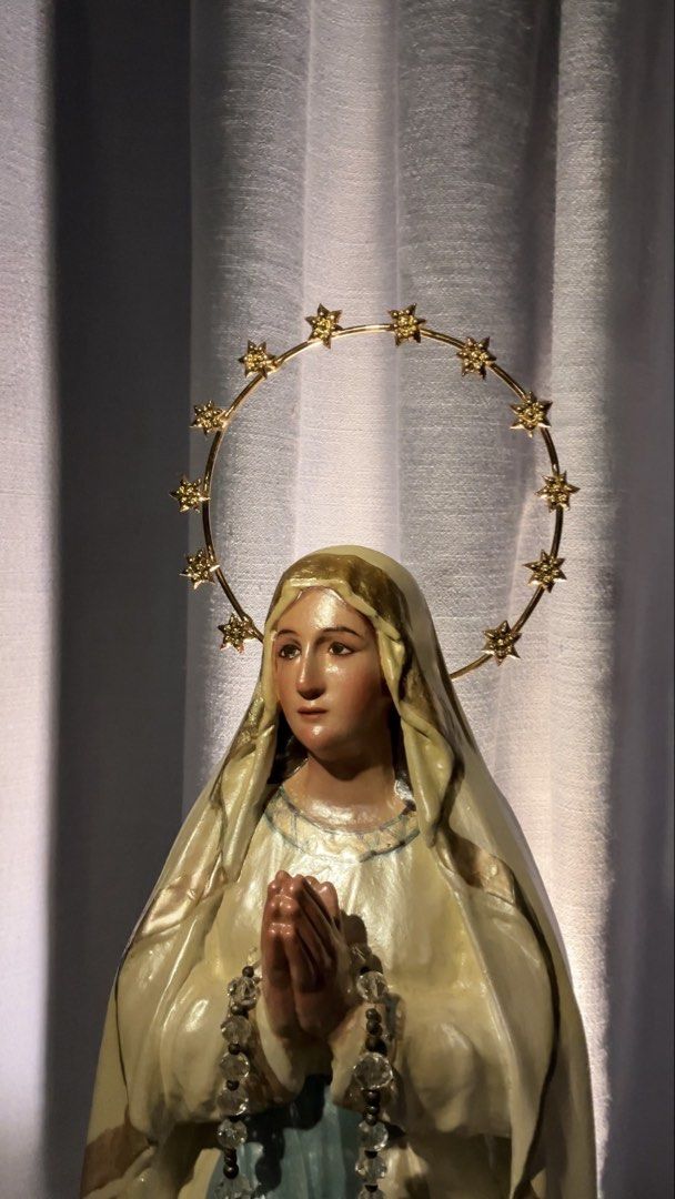 Lourdes de Manila (Category: Religious Items) located in Pasig City. Submitted by joshua_listing (Listing ID 1462504776, Image 1). Description: - Features a radiant golden halo adorned with stars. - Includes a rosary with clear beads. - Detailed rocky base with delicate rose accents. - Ideal for home display or personal devotion. - Stands approximately [21] inches tall..