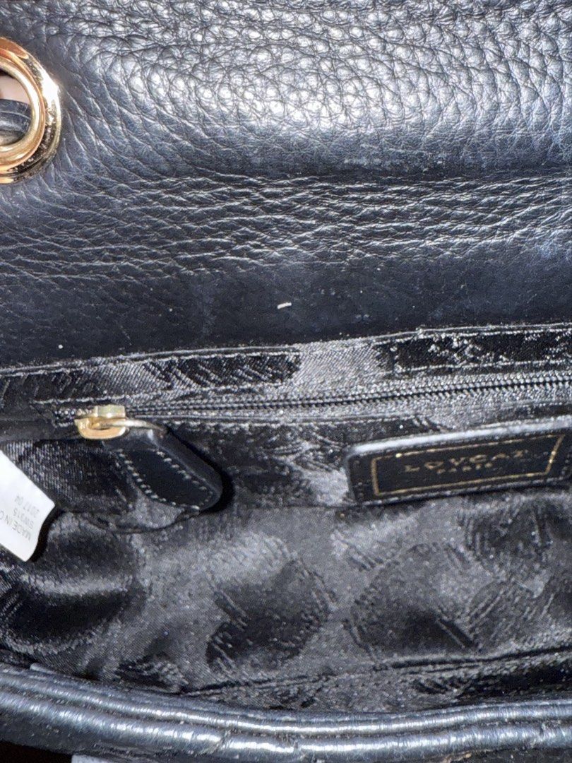 Lovcat Quilted Convertible Bag (Category: Shoulder Bags) located in Makati City. Submitted by amos411 (Listing ID 1462462224, Image 3). Description: Original Lovcat Quilted Convertible bag Can be used as shoulder bag or crossbody Size: Small Can fit phone and small wallet With signs of use on hardware lock RFS: decluterring.