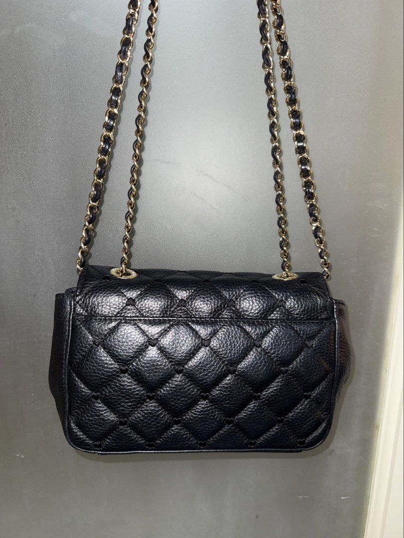 Lovcat Quilted Convertible Bag (Category: Shoulder Bags) located in Makati City. Submitted by amos411 (Listing ID 1462462224, Image 2). Description: Original Lovcat Quilted Convertible bag Can be used as shoulder bag or crossbody Size: Small Can fit phone and small wallet With signs of use on hardware lock RFS: decluterring.