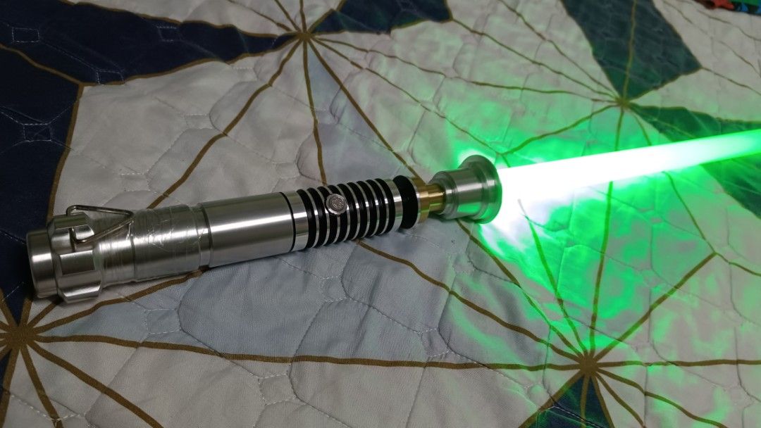Luke Skywalker Duel Grade Lightsaber (Category: Action & Battle Toys) located in Manila. Submitted by Drumsticx (Listing ID 1462579129, Image 2). Description: Dynamic Sabers Luke Skywalker Duel Grade Brand New w/box, charging cable, wrench INFO: *Gesture Ignition *Multicolor Baselit *Light effects *Duel Grade Saber *Aluminum Metal Alloy Hilt *Polycarbonate Blade *Sound Volume Adjustment *Flash on clash effect *Blaster deflect effect *Lock-On effe