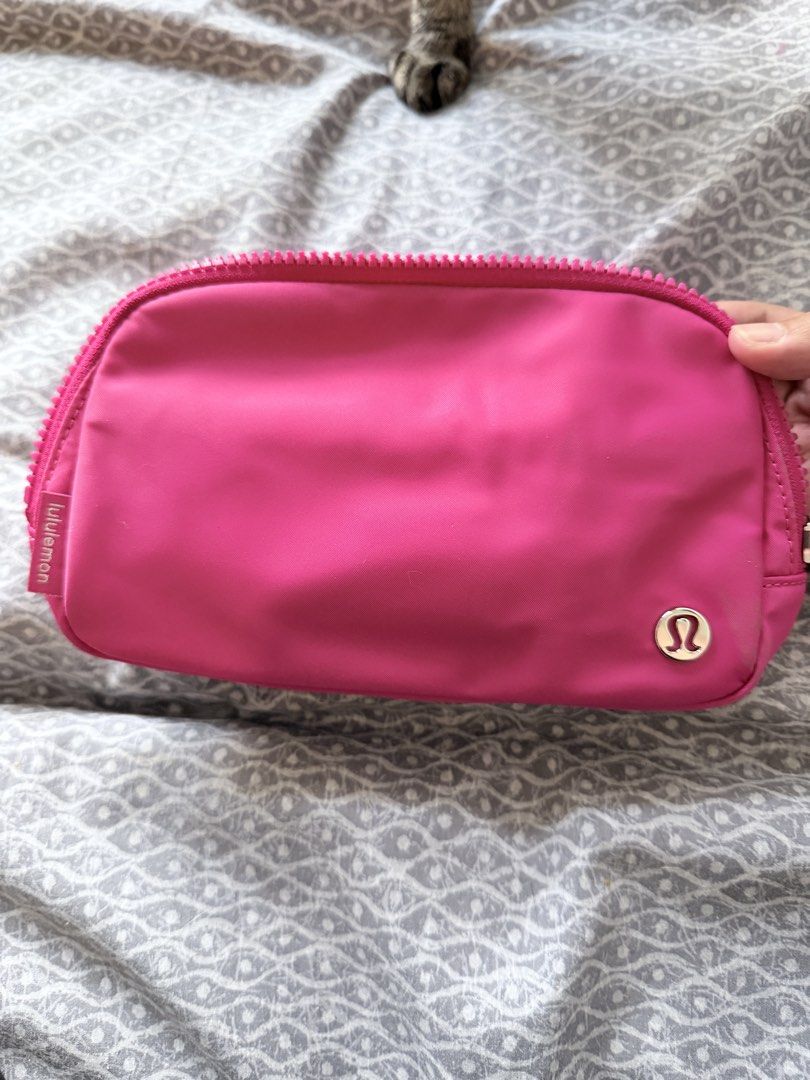 Lululemon Everywhere Belt Bag - Pink (Category: Cross-body Bags) located in Makati City. Submitted by purewind.a22dcd (Listing ID 1462531314, Image 1). Description: - Bright pink Lululemon Everywhere Belt Bag - Water-repellent fabric - Adjustable strap for comfortable wear - Zippered pockets for secure storage - Ideal for carrying essentials on the go - Dimensions: 7.5" (length) x 2" (width) x 5" (height).