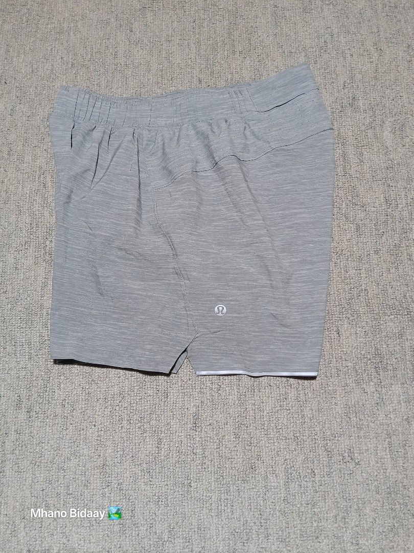 Lululemon Men's 4" Surge Short Lined Grey Small (Category: Activewear) located in Valencia. Submitted by mhano_bidaay_outdoors_218 (Listing ID 1462552941, Image 2). Description: - Lululemon Men's 4" Surge Shorts - Color: Grey - Lined with quick-drying, lightweight fabric - Waistline fits 27-29 inches - Leg opening: 11.75 inches - Ideal for workouts and casual wear.