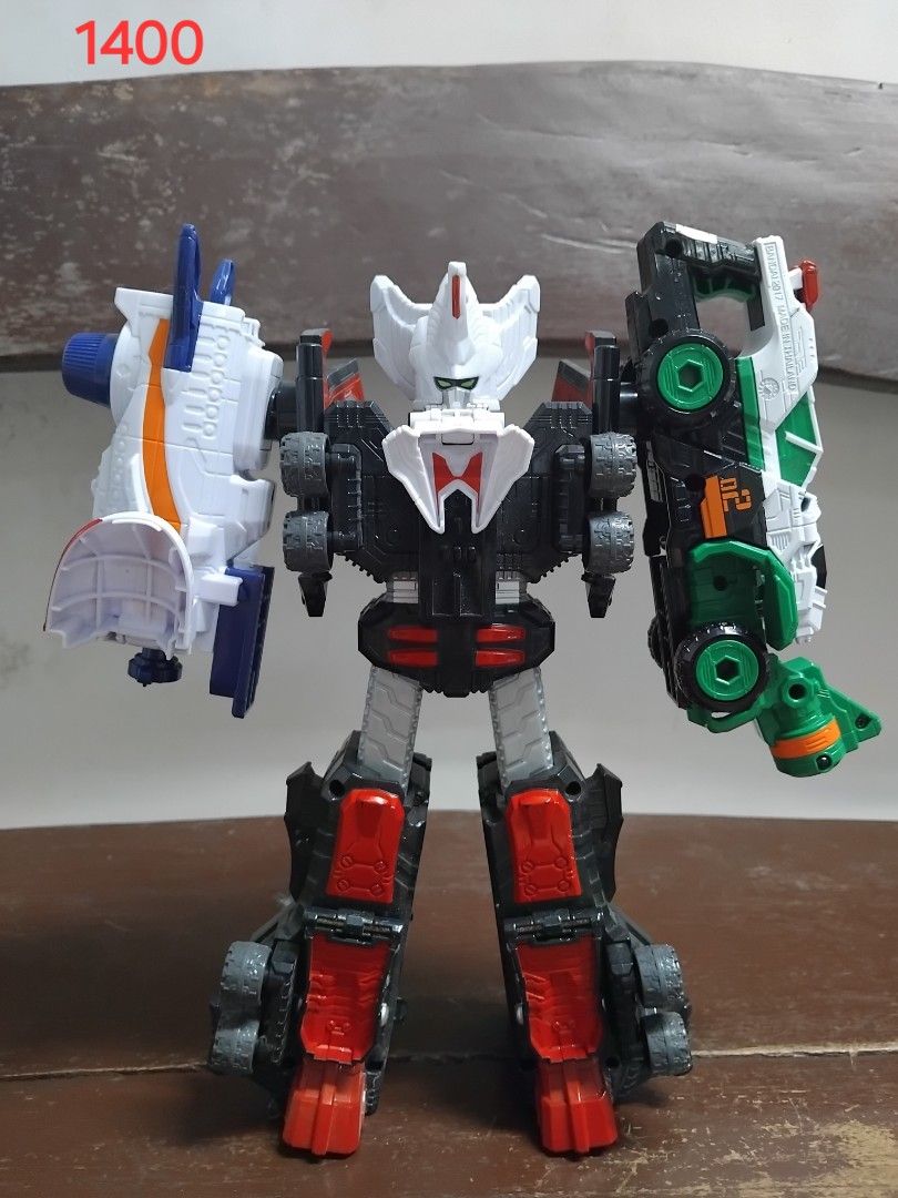 Lupin Robo dx (Category: Action & Battle Toys) located in San Fernando. Submitted by imlikeabird (Listing ID 1462592549, Image 2). Description: - Cool transforming robot toy - Combines multiple vehicles into one - Features a blue jet on the left arm - Features a green vehicle on the right arm - Red and white robot body - Great for kids who love action figures - Transforms into different modes - Fun for playtime.