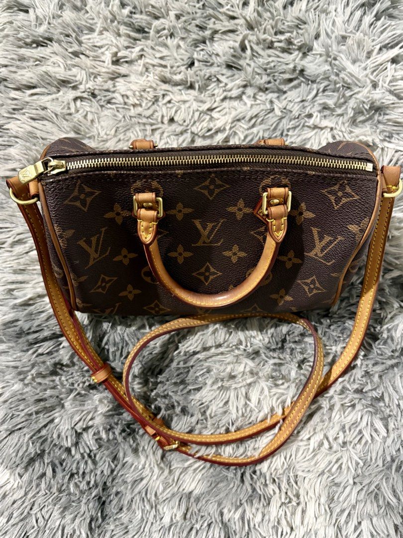 LV Nano Speedy (Category: Luxury Bags & Wallets) located in Manila. Submitted by jlj_v.2_oshop (Listing ID 1462608547, Image 1). Description: Classic LV Nano Speedy Bando crafted in the iconic Monogram coated canvas with natural cowhide leather trim and crossbody strap. These preloved bags and shoes are sourced from Japan, Korea, and Thailand through a seller friend. They are well-loved items, and authenticity is not guaranteed unless stated as o