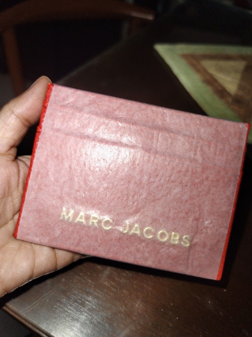 Marc Jacobs Card Holder - White Textured Leather (Category: Wallets & Card holders) located in Cavite. Submitted by sweetalittlemonstertoo (Listing ID 1462490384, Image 1). Description: 250 EACH white sold MOP GCASH PLUS SF - Marc Jacobs card holder - red extured leather - Multiple card slots for organization - Compact and stylish design.