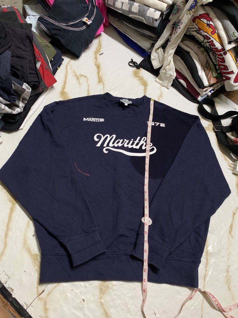 MARITHE FRANCOIS GIRBAUD Navy Blue Sweatshirt Size M (Category: Coats, Jackets and Outerwear) located in Iloilo. Submitted by johnpullan30303 (Listing ID 1462577996, Image 1). Description: - Navy blue Marithe Francois Girbaud sweatshirt - Features brand name and '1972' graphic - Size: Medium (M) - Ideal for everyday casual wear.