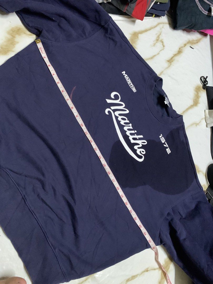 MARITHE FRANCOIS GIRBAUD Navy Blue Sweatshirt Size M (Category: Coats, Jackets and Outerwear) located in Iloilo. Submitted by johnpullan30303 (Listing ID 1462577996, Image 2). Description: - Navy blue Marithe Francois Girbaud sweatshirt - Features brand name and '1972' graphic - Size: Medium (M) - Ideal for everyday casual wear.