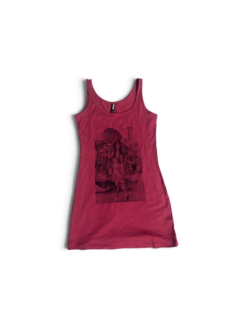 Maroon Tank Top with Graphic Print (Category: Sleeveless) located in Valenzuela. Submitted by sam_tnb17 (Listing ID 1462514821, Image 1). Description: - Maroon tank top - Black graphic print on front (person and structures scene) - Comfortable fit - Soft fabric - Great for casual wear - Ideal for layering or wearing alone.