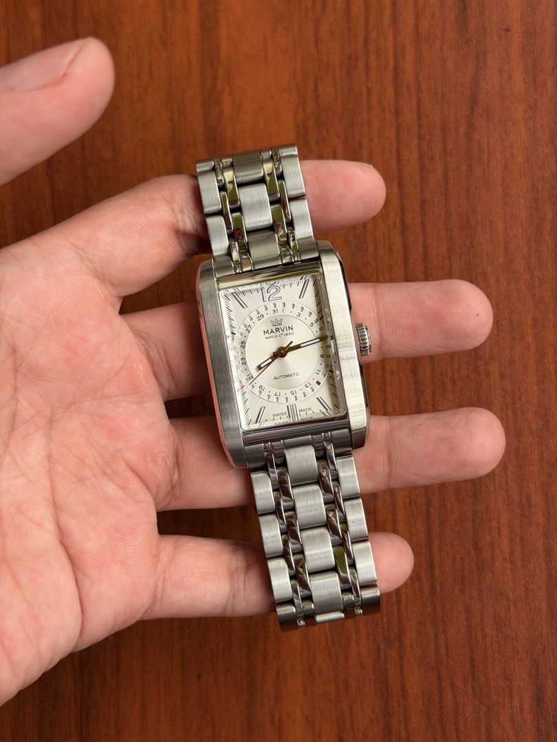 Marvin Watch C. 1850 Rectangular Automatic Pointer Date (Category: Luxury Watches) located in Quezon City. Submitted by lucas_luxuries (Listing ID 1462494774, Image 2). Description: For sale/trade Marvin Watch C. 1850 Rectangular Automatic Pointer Date ₱32,500 only • Reference: M107.13.21.74 • Condition: 9/10 • Inclusions: Box, travel case, manual, cards, extra links, etc. • Swiss automatic movement with Caliber Sellita200 • Hacking seconds • 38 