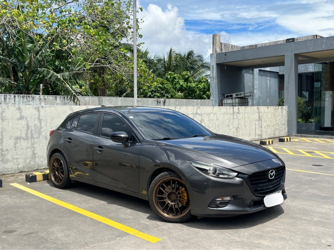 Mazda 3 2.0 Hatchback (A) (Category: Used Cars) located in Quezon City. Submitted by userhej (Listing ID 1462578790, Image 2). Description: Hello! I’m selling my 2018 Mazda 3 2.0R Skyactiv-G Hatchback ✅ Registered until 2027 ✅ 55k mileage only ✅ No issues / Good running condition ✅ Complete original OR/CR Upgrades & Accessories: 💨 Full exhaust by Drift Xaust 🛞 New Rota SVN mags and Kumho Ecsta tires 🪧Plate relocator and rear diffuser from Miks