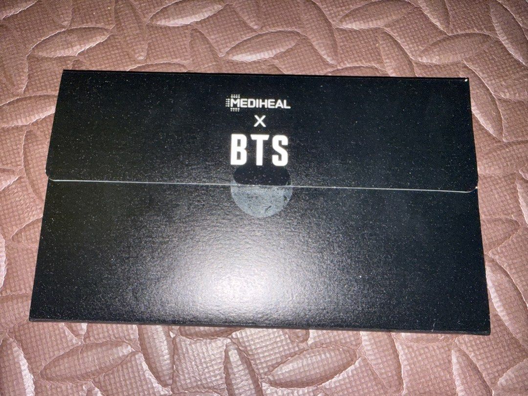 Mediheal x BTS Collaboration Postcard Set (Category: K-Wave Merchandise) located in Manila. Submitted by aizamariel82853 (Listing ID 1462623368, Image 2). Description: - Mediheal x BTS collaboration set - Includes a large photocard featuring all BTS members - Packaged in a black box with Mediheal and BTS logos - Ideal for BTS fans and collectors.
