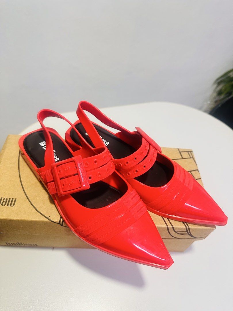 Melissa Ladyke Ad Red Slingback Heels (Category: Heels) located in Cavite. Submitted by mg.pangilinan (Listing ID 1462551946, Image 3). Description: - Red Melissa slingback heels - Pointed toe with buckle strap detail - Made from signature Melissa jelly material - Comes with original box - Size 5.