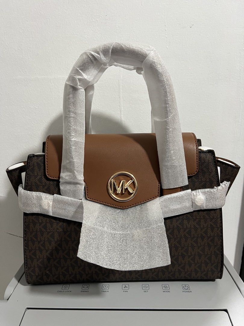 MICHAEL KORS CARMEN MEDIUM (Category: Tote Bags) located in Baguio. Submitted by kyrawang22 (Listing ID 1462668102, Image 1). Description: .