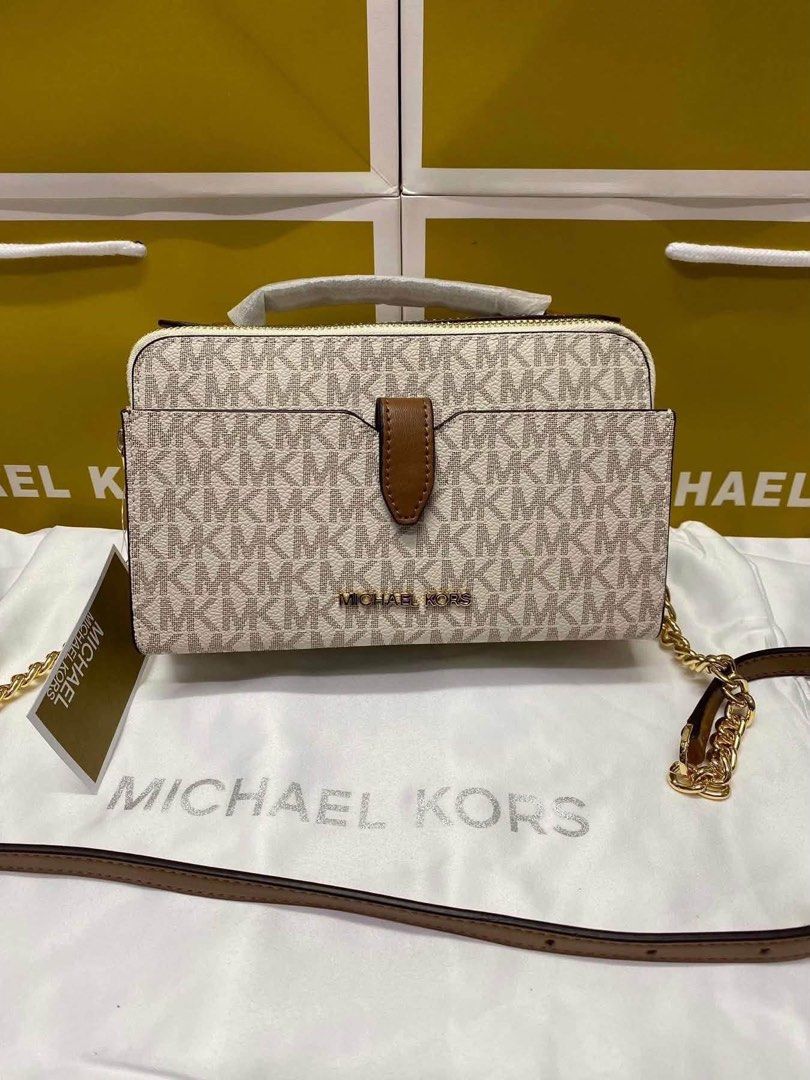 Michael Kors Medium Double Zip Phone Crossbody (Category: Cross-body Bags) located in Bulacan. Submitted by mykakarizza (Listing ID 1462650629, Image 3). Description: .