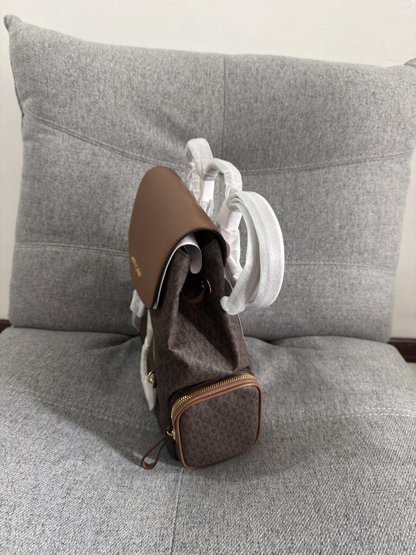 Michael Kors Signature Jet Set Large Logo Backpack (Category: Backpacks) located in Las Pinas. Submitted by bestthriftinspo (Listing ID 1462676846, Image 2). Description: Authentic Michael Kors backpack in Brown.