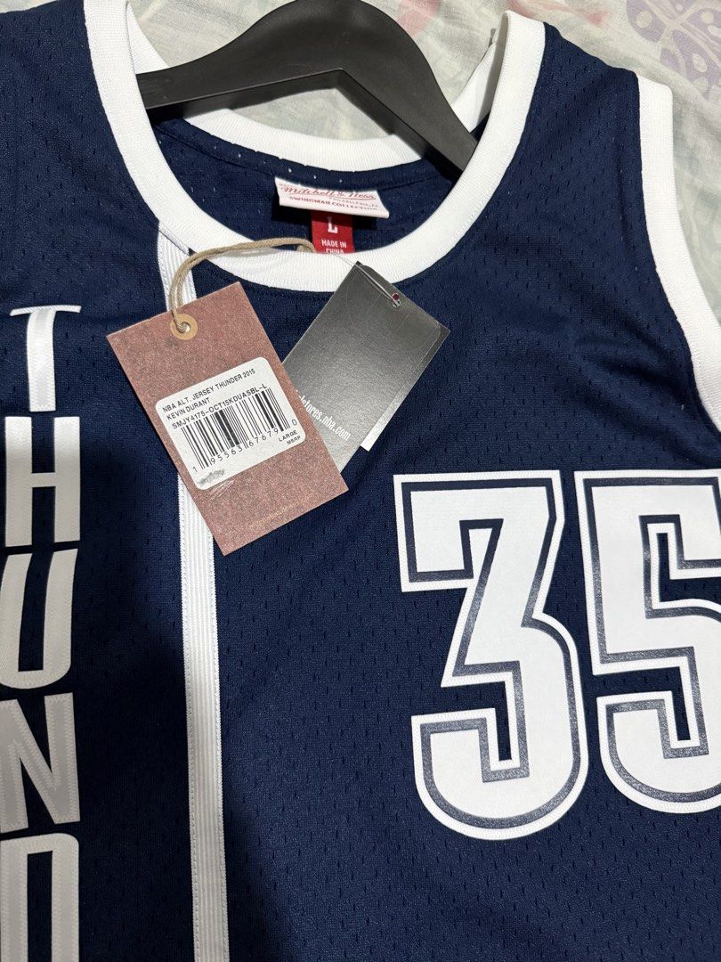 Mitchell & Ness Kevin Durant Thunder 35 Jersey (Category: Activewear) located in San Luis. Submitted by pjstatue (Listing ID 1462604439, Image 3). Description: - Mitchell & Ness Hardwood Classics Jersey - Features Kevin Durant #35 - Oklahoma City Thunder - 2015-16 Swingman Edition - Made in USA - Brand new with tags attached - Measurements: Pit to pit approx 23 inches, length approx 30 inches.