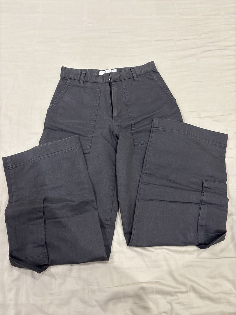 Miu the Label Cargo Pants (Category: Other Bottoms) located in Paranaque City. Submitted by kaescloset.18 (Listing ID 1462562989, Image 3). Description: - Bundle includes 2 pairs of cargo pants: 1 light beige, 1 dark grey. - gray cargo pants (a bit faded) - cream cargo pants (has yellow stains from storage).