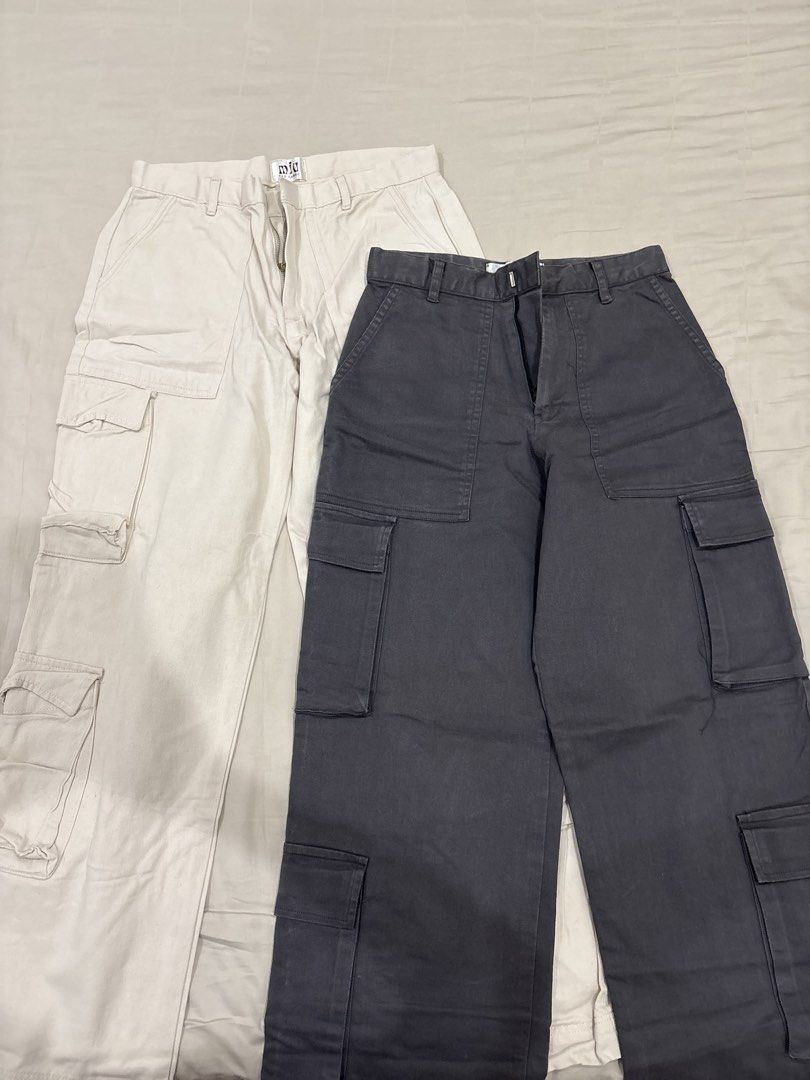 Miu the Label Cargo Pants (Category: Other Bottoms) located in Paranaque City. Submitted by kaescloset.18 (Listing ID 1462562989, Image 1). Description: - Bundle includes 2 pairs of cargo pants: 1 light beige, 1 dark grey. - gray cargo pants (a bit faded) - cream cargo pants (has yellow stains from storage).