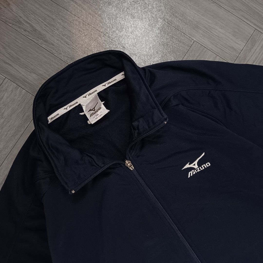 Mizuno 2000s Full Zip Track Jacket (Category: Coats, Jackets and Outerwear) located in Los Banos. Submitted by ndrwthrift (Listing ID 1462645501, Image 2). Description: Mizuno 2000s Full Zip Track Jacket Condition - 9/10 Size - XXL on tag Dimes - L 28" W 23" Color Rate - 9/10 Issue - Slightly faded print on sleeves *meet up or shipping via lalamove (buyer's expense) *can ship nationwide via j&t.