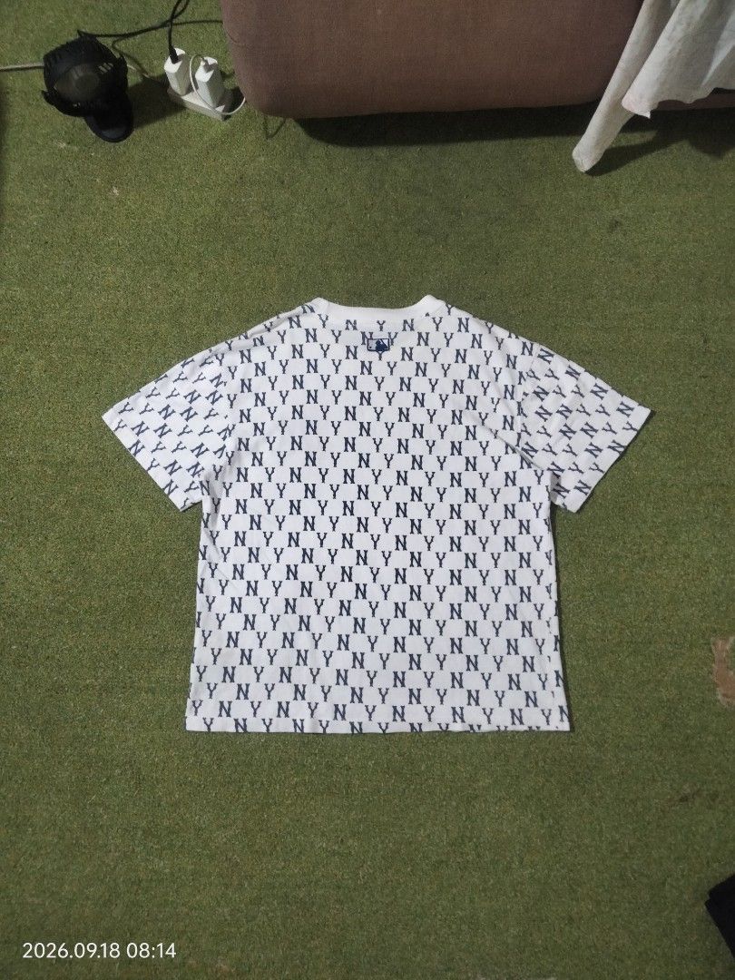 MLB New York Yankees All Over Print (Category: Tshirts & Polo Shirts ) located in Caloocan City. Submitted by haruconcep52476 (Listing ID 1462448160, Image 2). Description: Dimensions W20.5×L25.5 Good condition Color rate 9 Issue need wash / yellow stain - White t-shirt with all-over NY Yankees print - Classic NY logo prominently displayed on the chest - Made from comfortable, breathable fabric - Ideal for any dedicated New York Yankees fan - Ver