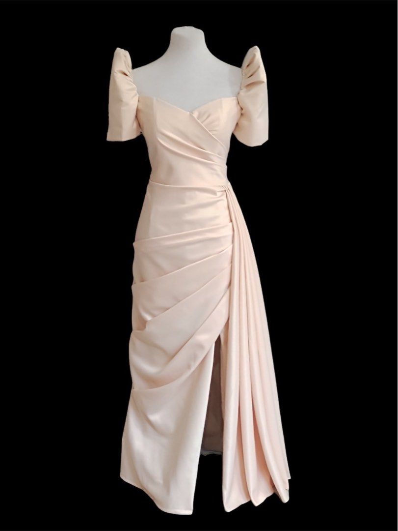 Modern Filipiniana (Category: Evening dresses & gowns) located in Odiongan. Submitted by mheikyway (Listing ID 1462447675, Image 2). Description: - Beautiful light peach gown - Elegant puff sleeves - Flattering sweetheart neckline - Stylish draped skirt detail - Thigh-high slit for a chic look - Smooth, satin-like fabric - Perfect for formal events, parties, and special occasions - Please check the size chart for accurate measurements Original Pr