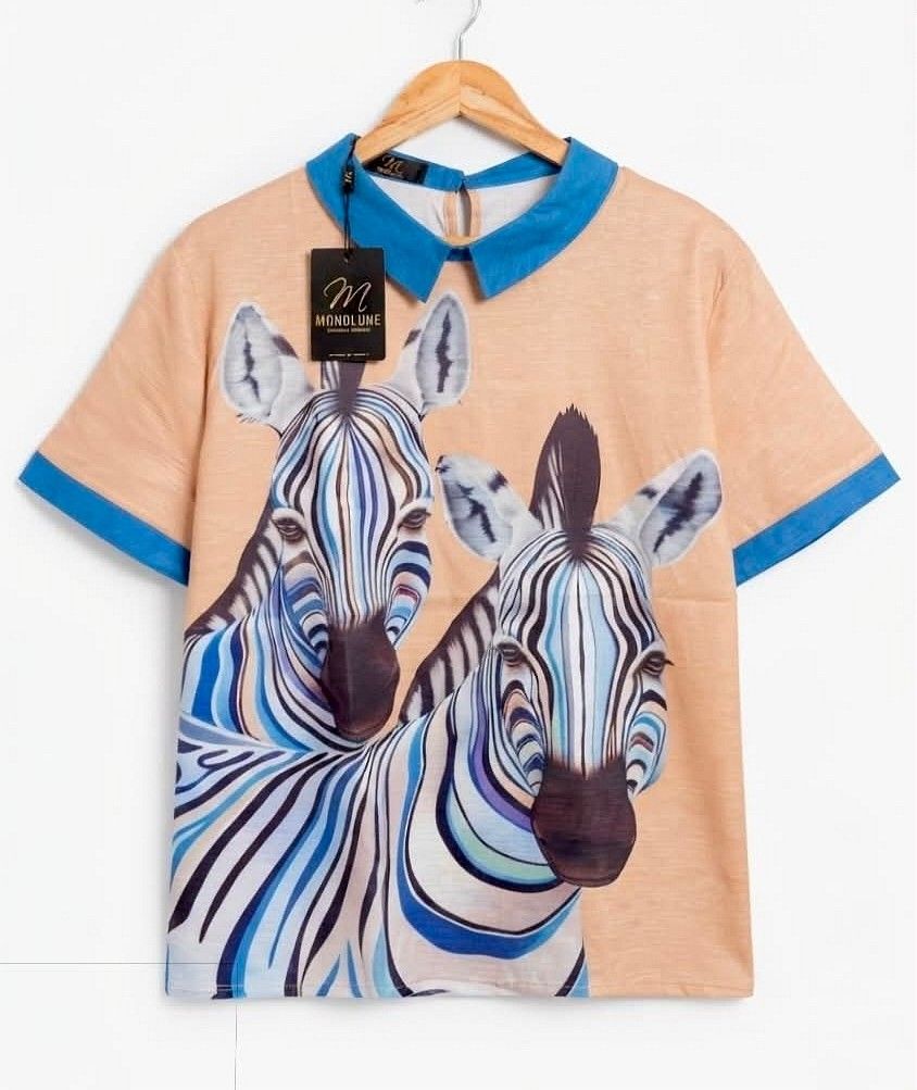 Mondlune Zebra printed Collared Tops (Category: Blouses) located in Quezon City. Submitted by panapton.ph (Listing ID 1462629196, Image 3). Description: -FLASH SALE ONLY 850 - Brandnew Bangkok Tops - Brand Mondlune - Actual item post -Size fit 34 to 46bust -Pattern: Eye-catching, artistic zebra graphic print featuring vivid blue, purple, and black stripes against a warm beige/camel-colored background. The vibrant animal print covers both the fron