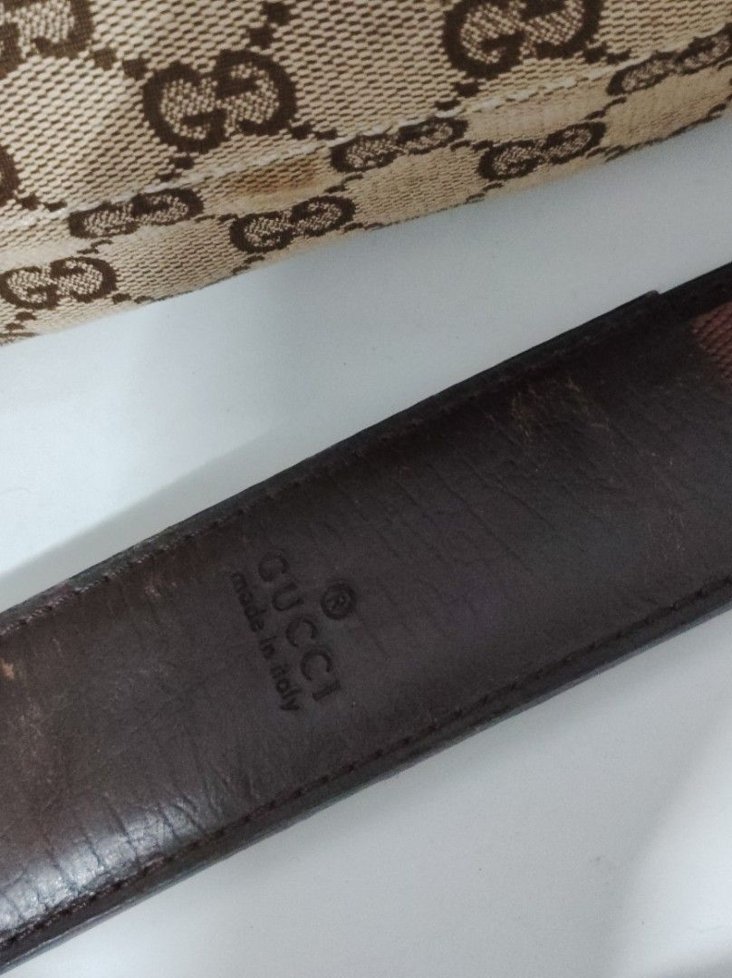 Monogram Flat Messenger Bag Dark Brown (Category: Luxury Bags & Wallets) located in Santa Rosa. Submitted by sassycollection. (Listing ID 1462460879, Image 3). Description: This is a GUCCI Monogram Flat Messenger Bag in Dark Brown. This stylish messenger bag is crafted of GG monogram canvas in brown. The bag features dark brown leather trim, a nylon crossbody strap with a silver adjustment buckle, and a front pocket. The top zipper opens to a dar