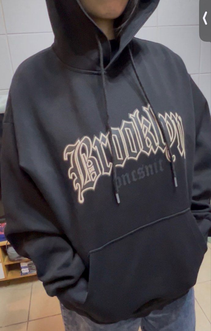 Brooklyn Bear Graphic Hoodie Size L (Category: Hoodies) located in Surigao. Submitted by boonz71_1971 (Listing ID 1462646145, Image 2). Description: Declutter sale - Gently used - Width 23” Length 26” - Brand: Moxieyuansu - Type: Hoodie - Color: Black - Size: L - Front Graphic: 'Brooklyn' - Back Graphic: Bear - Style: Casual wear - Condition: Please check photos for detailed condition..