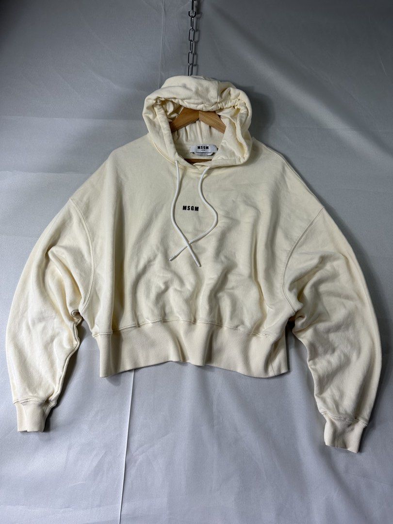 MSGM Cream Semi Cropped Hoody (Category: Coats, Jackets and Outerwear) located in Cabanglasan. Submitted by thefashiongarage.co (Listing ID 1462448412, Image 1). Description: Title - MsGM Model/Name - Semi Cropped Hoody Size on Tag - Medium Conditiion - Excellent Condition with no major isuue Dimension (WxLxH) - Category- Casual Fitting - Loose Fit Made in - Italy Material - 100% Cotton Color - Cream Design - Semi Cropped with printed Chest logo 