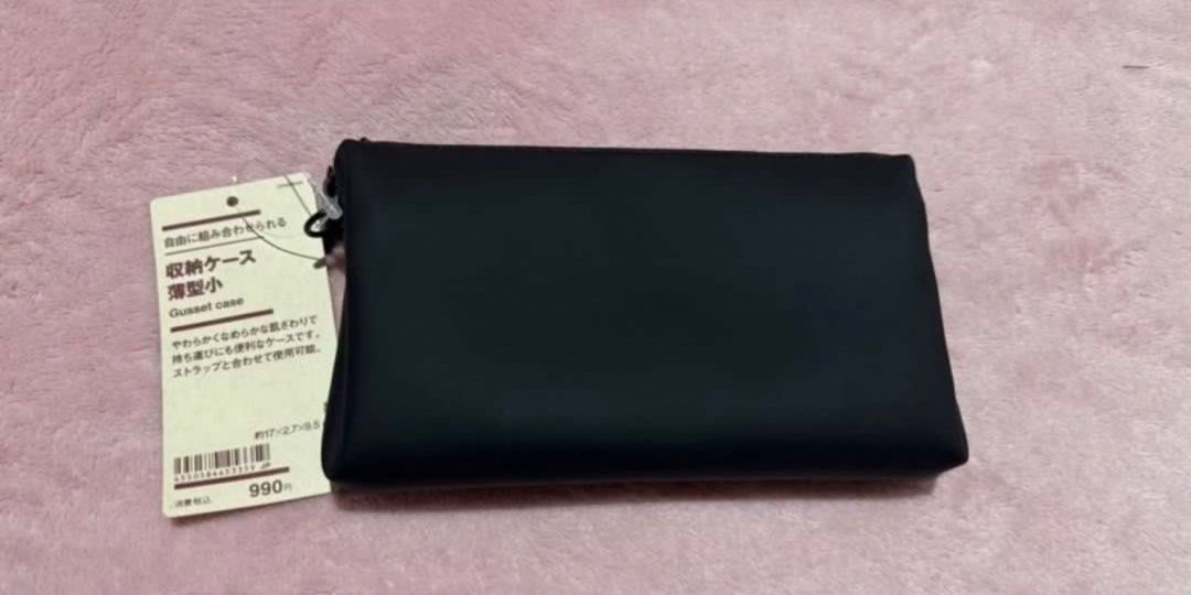 Muji Black Gusset Cases (Small & Large) with Strap (Category: Clutches) located in Pasay City. Submitted by szepter (Listing ID 1462444439, Image 3). Description: - Set of 2 Muji gusset storage cases - Color: Black - Sizes: 1 Large, 1 Small - Features: Zippers, internal pockets - Includes: Black strap - Ideal for organizing essentials - Can be used together or separately - Brand new with tags still attached.