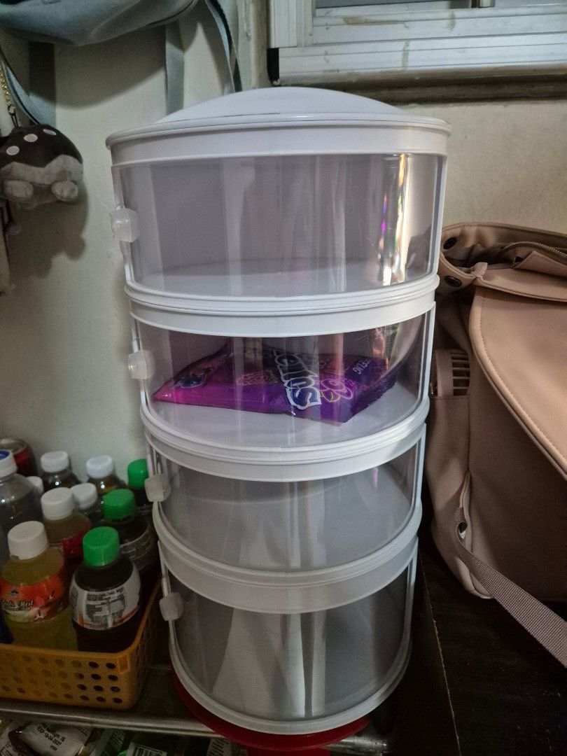 Multi-layer stackable food storage (4 layer) (Category: Storage Boxes & Baskets) located in Singapore. Submitted by kristin7107 (Listing ID 1462626085, Image 2). Description: Selling for $10 and in good condition. Other platform sells similar at $17.90..