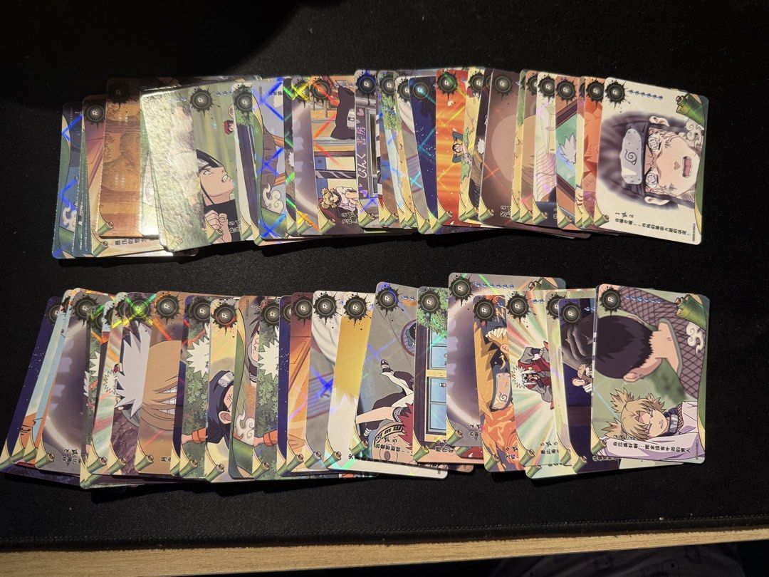 Naruto Cards Collection (Category: Raw Singles) located in Tuguegarao City. Submitted by janurtist (Listing ID 1462473097, Image 1). Description: - Stack of Naruto cards for sale. - Features a variety of characters and cool artwork. - cards have a shiny, holographic finish. - Ideal for any Naruto fan or collector. - Sold as set - Feel free to ask any questions! With free naruto box Selling Price: 800 SF not included Ship via J&T Loc: Abulug, Caga