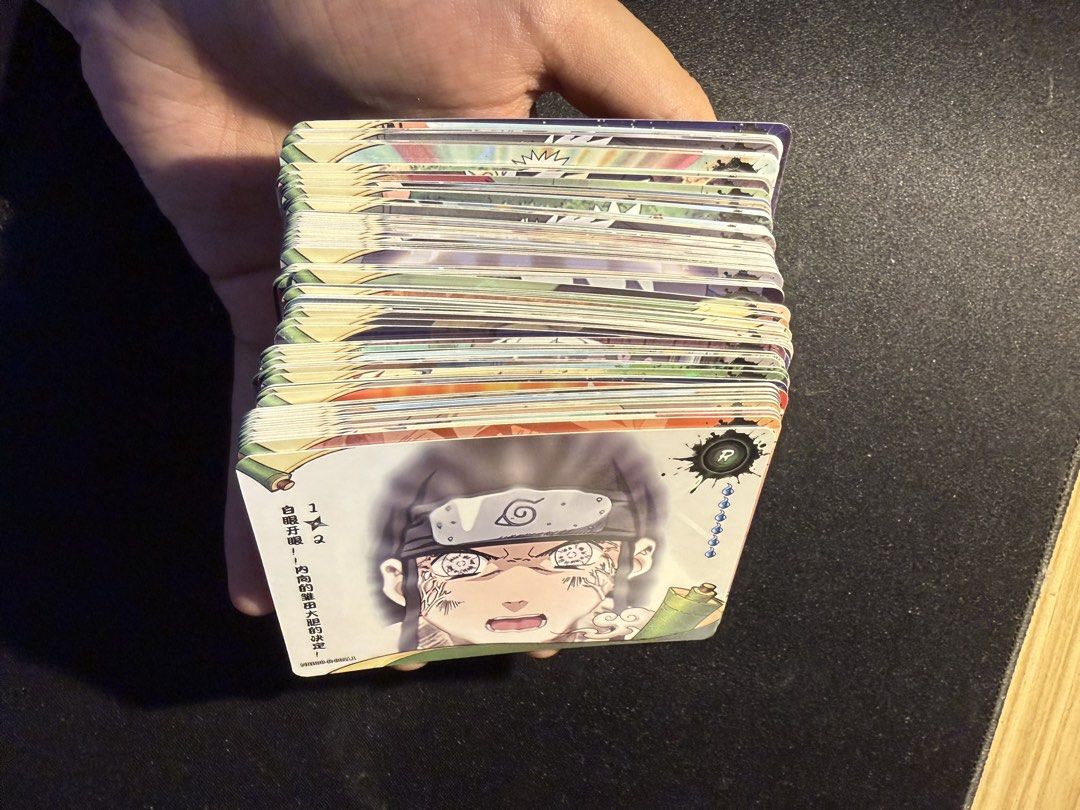 Naruto Cards Collection (Category: Raw Singles) located in Tuguegarao City. Submitted by janurtist (Listing ID 1462473097, Image 3). Description: - Stack of Naruto cards for sale. - Features a variety of characters and cool artwork. - cards have a shiny, holographic finish. - Ideal for any Naruto fan or collector. - Sold as set - Feel free to ask any questions! With free naruto box Selling Price: 800 SF not included Ship via J&T Loc: Abulug, Caga