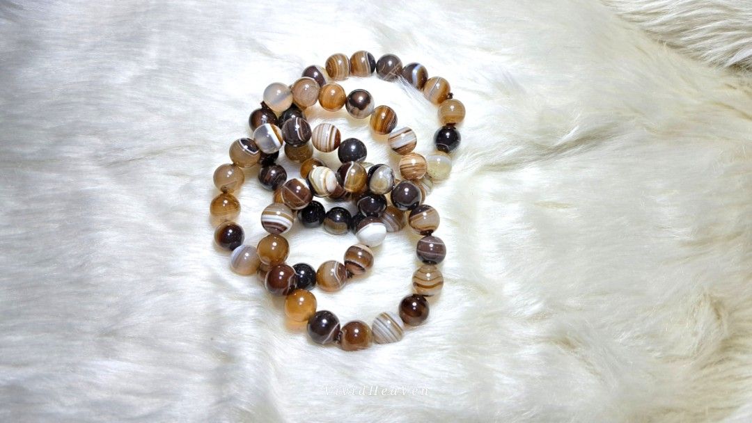 Natural Botswana Agate Stone Beaded Bracelet (Category: Bracelets) located in Quezon City. Submitted by crystallinehaven (Listing ID 1462664272, Image 2). Description: 3 beautiful natural agate stone bracelets. ♦️3 pcs 12mm size ♦️p680 each - Each bead features unique brown, white, and black banding patterns. - Stretchy cord for comfortable and easy wear. - Ideal for stacking with other bracelets or wearing solo. - Makes a wonderful gift idea 💎R